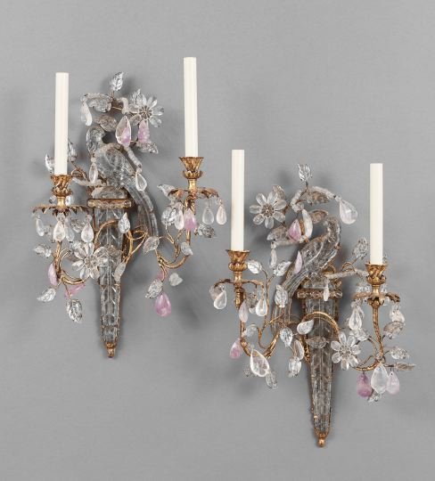 Pair of Faux Rock Crystal and Gilt-Metal Sconces: Pair of Faux Rock Crystal and Gilt-Metal Two-Light Sconces, in the Louis XV style, the torch-form backplates support phoenix birds and asymmetrical candle branches, set with crystal flowers, and a var