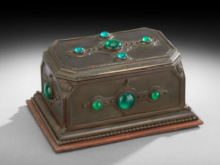 Continental Brass Jewel Casket: Continental Brass Jewel Casket, fourth quarter 19th century, in the Renaissance Revival style, the box mounted to a mahogany base board, and decorated with applied crosses with applied "emeralds", tri