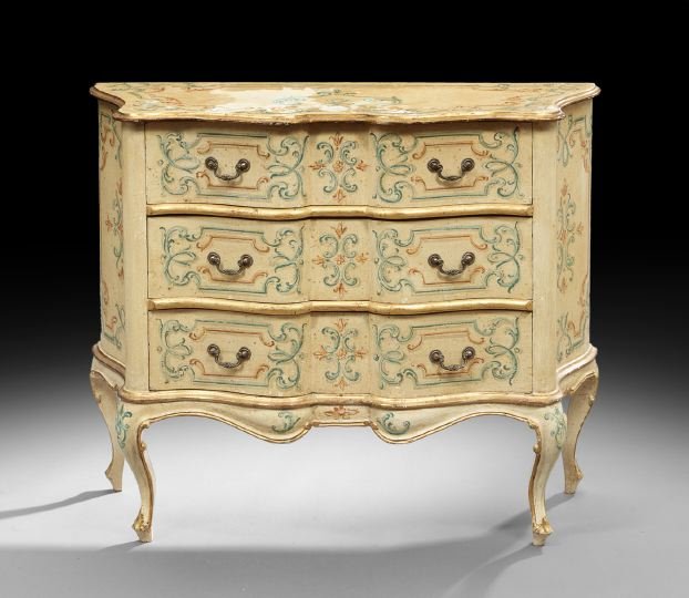 Italian Polychrome Commode: Italian Polychrome Commode, 20th century, the shaped top above a conforming case fitted with three long drawers, raised on cabriole legs ending in scrolled toes, the whole accented with polychrome scr