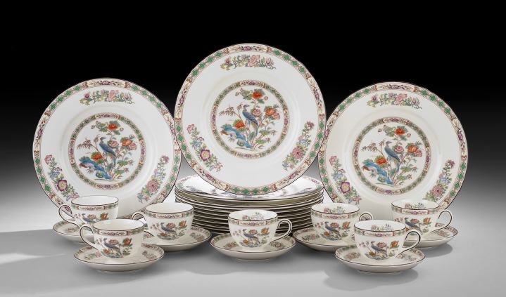 Wedgwood "Kutani Crane" Partial Dinner Service: Wedgwood "Kutani Crane" Partial Dinner Service, decorated with phoenix birds and peonies, the set comprised of thirteen plates, dia. 10-3/4", seven cups, h. 3", and seven saucers, dia. 5-3/4".