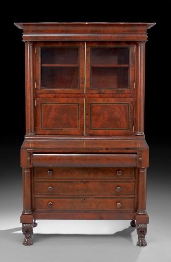American Classical Mahogany Secretary-Bookcase: American Late Classical Line-Strung, Ebonized and Mahogany Secretary-Bookcase, second quarter 19th century, probably Boston, the upper section with molded cornice over a pair of glazed doors over blin