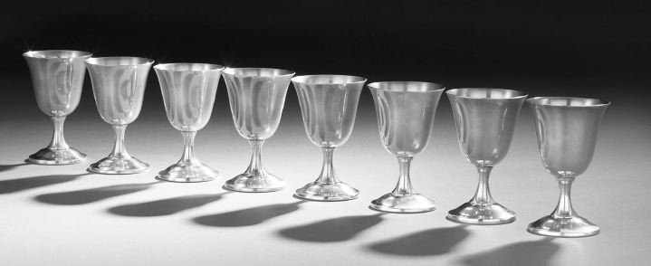 Set of Eight Sterling Silver Wine Goblets: Set of Eight Sterling Silver Wine Goblets, third quarter 20th century, by Wallace Silversmiths, Wallingford, Connecticut, with inverted bell body and trumpeting stem, h. 4-1/8", 15.69 total t. oz.