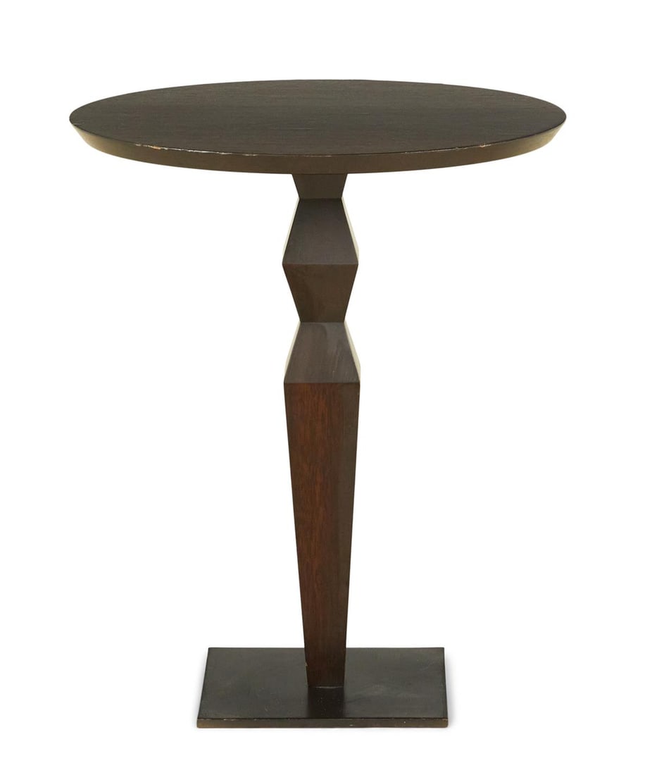 Christian Liaigre/Holly Hunt "Pygmee" Side Table: Christian Liaigre for Holly Hunt "Pygmee" Mahogany Side Tablethe circular top supported by a shaped pedestal standard and mounted to a square iron base.h. 24", dia. 20"