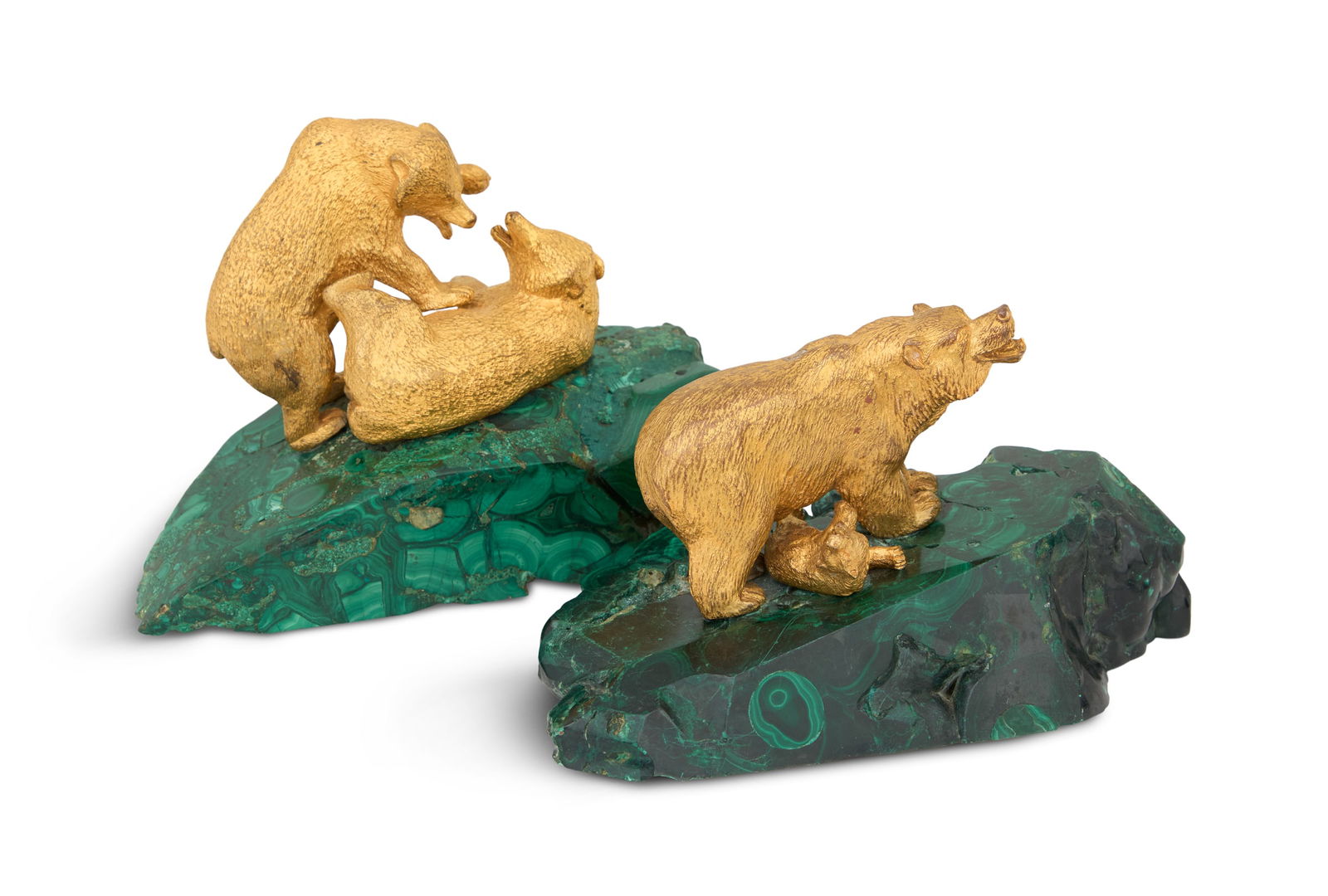 Two Russian Gilt-Bronze Bears on Malachite Bases: Two Russian Gilt-Bronze Bears on Malachite Bases20th century, one with two wrestling bears and the other with a mama bear and her cub, each on a hewn malachite base.h. 5" to 5-3/4", w. 7-1/4" to 8", d