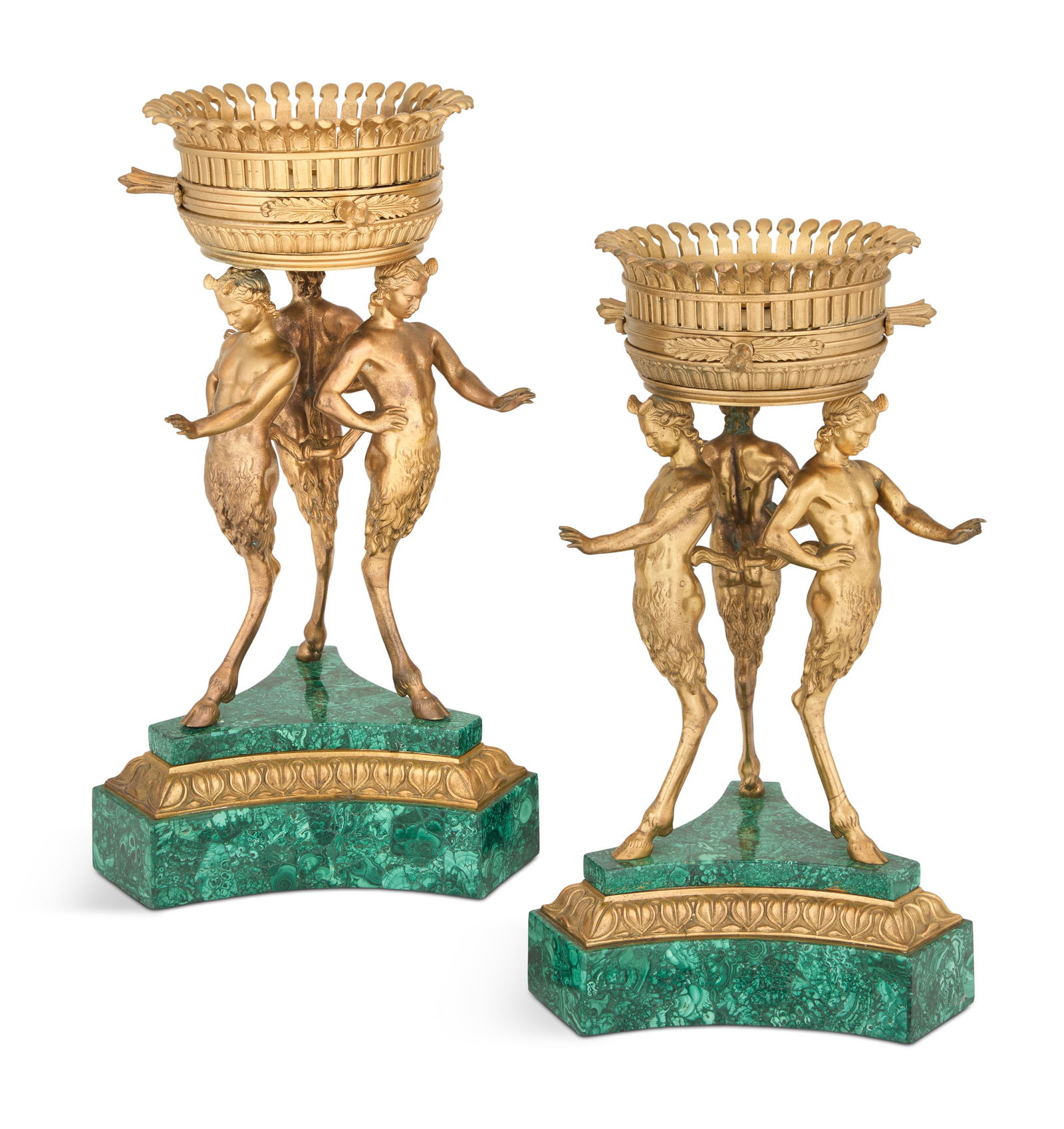 Pair of Gilt-Bronze and Malachite Corbeilles: Pair of Gilt-Bronze and Malachite Corbeilles20th century, Russian or French, the pierced baskets supported by monopodial satyrs, on double malachite bases with lotus-molded gilt-bronze trim.h. 16-1/2"