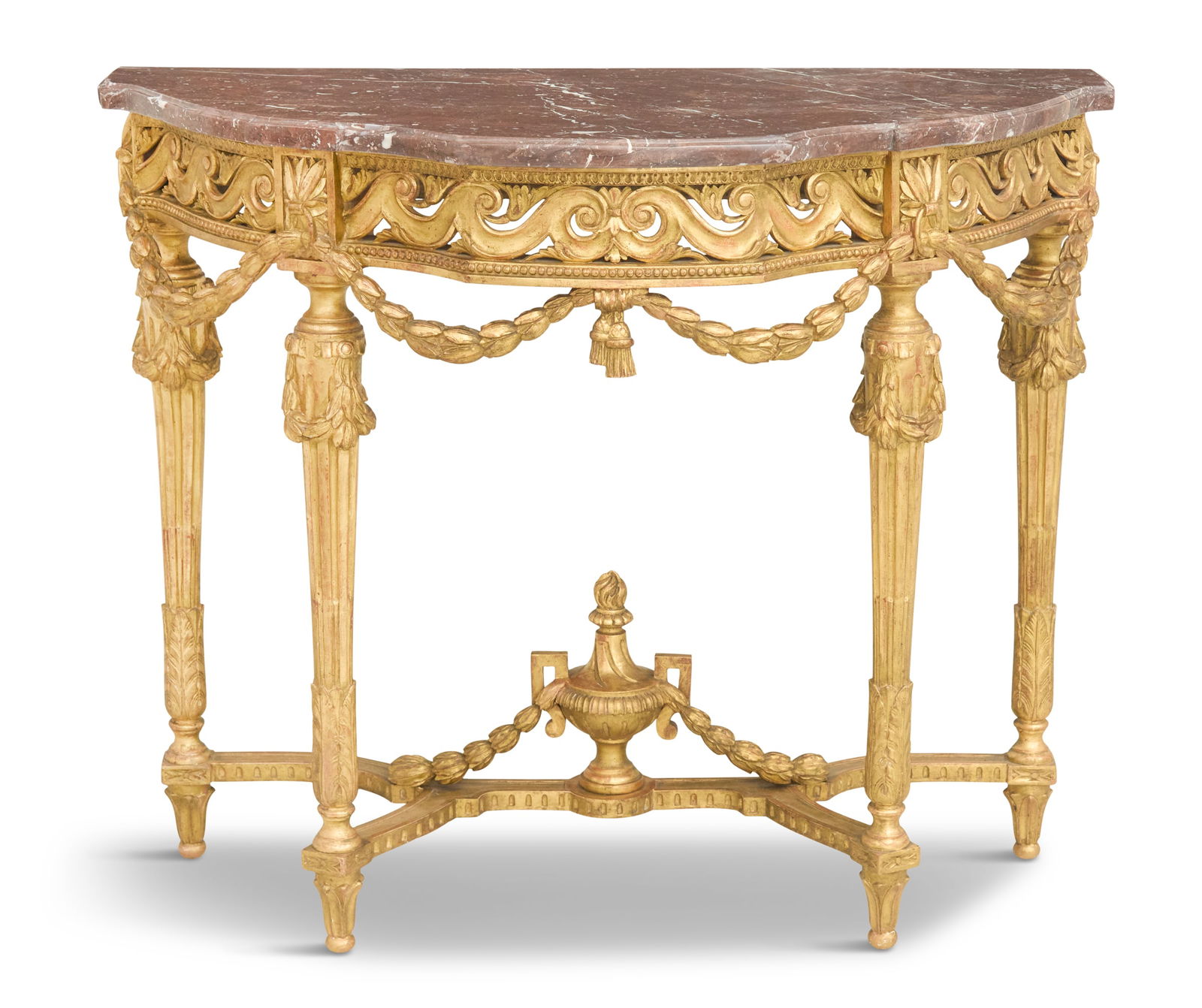 Louis XVI-Style Marble-Top Console Table: Louis XVI-Style Giltwood and Marble-Top Console Table19th century, the shaped rouge marble top over a pierced and scroll-carved apron with laurel swags, raised on carved and stop-fluted turned legs.h.
