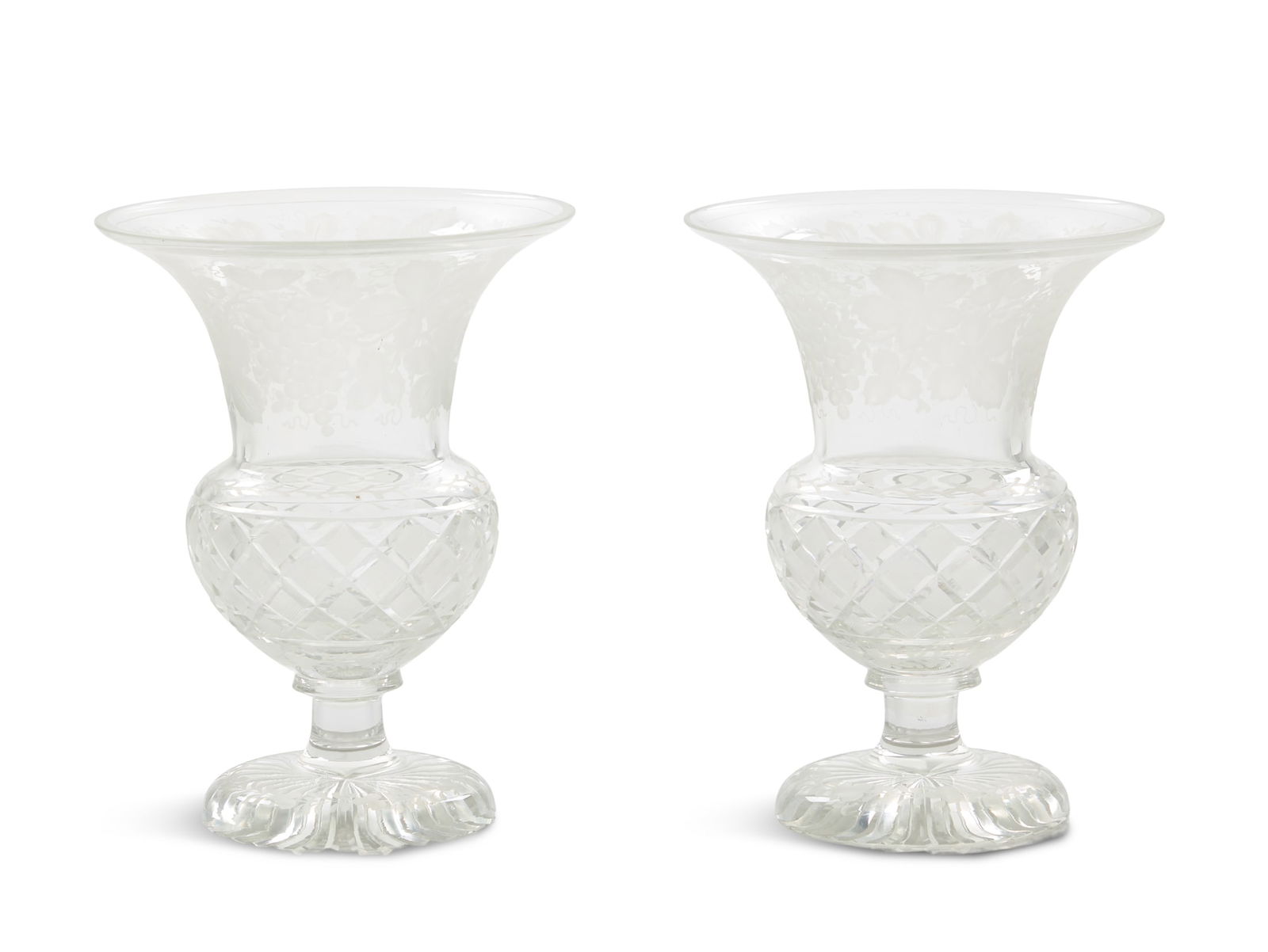 Pair of Edwardian Glass Celery Vases: Pair of Edwardian Cut- and Engraved Glass Celery Vases first quarter 20th century, the upper portions with lush engraved fruit and leaves over a bulbous strawberry-cut portion, the bases with
