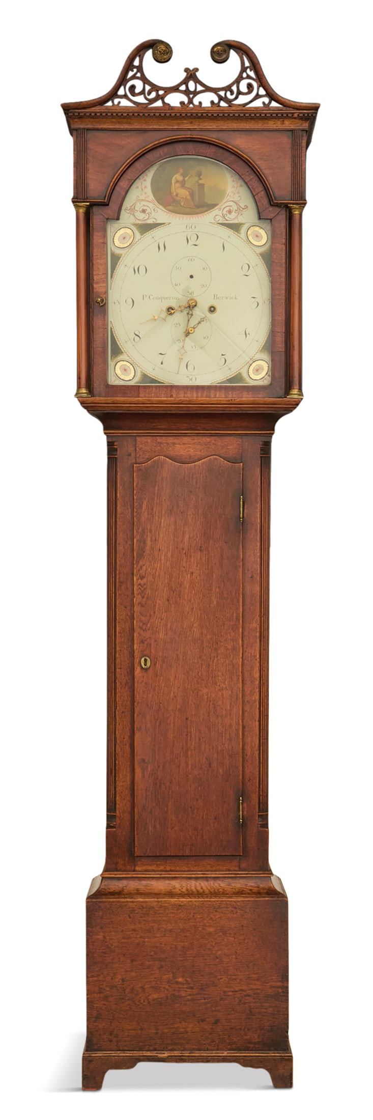 Georgian Oak Tall Case Clock: Georgian Oak Tall Case Clock late 18th century, the pierced broken-arch crest over a dentillated molding, the corners of the hood with straight columns and brass capitals, the case with one-quarter