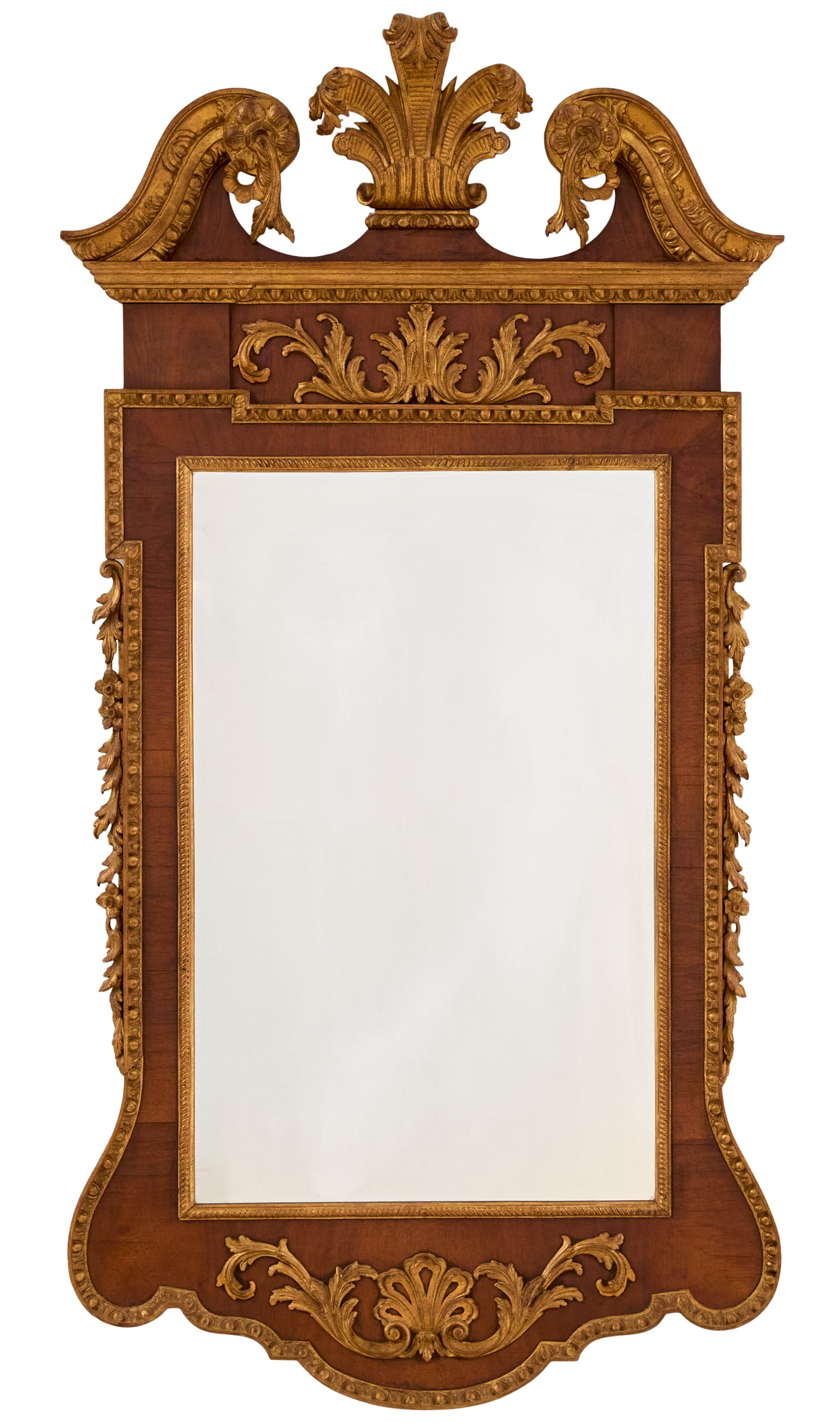 Edwardian Parcel-Gilt Mahogany Mirror: Edwardian Parcel-Gilt Mahogany Mirrorfirst quarter 20th century, in the George II taste, the giltwood carved swan's-neck pediment set with a leaf-carved finial, the mahogany-veneered surround with cro