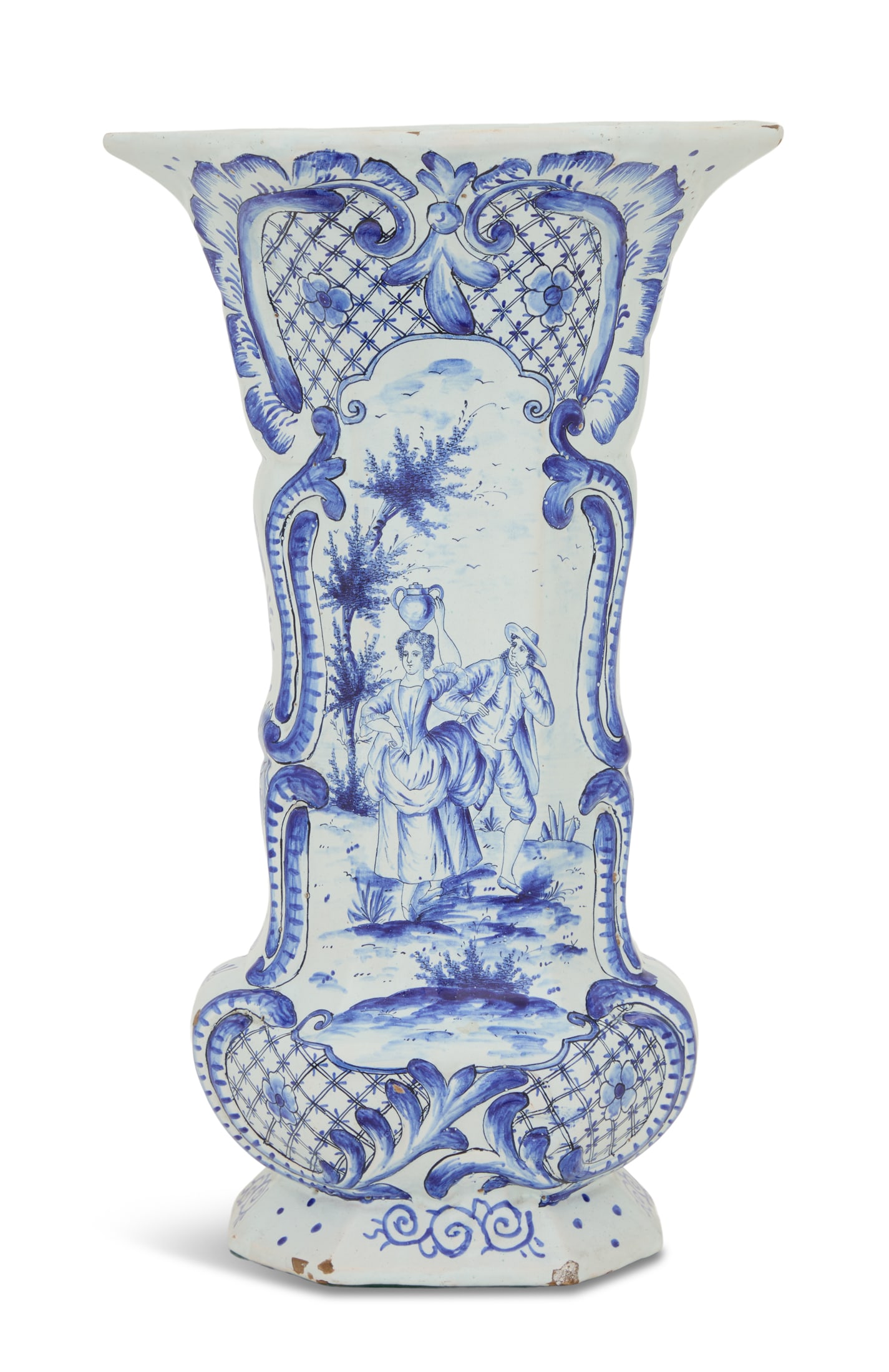 Delft Pottery Beaker Vase: Delft Pottery Beaker Vase20th century, the faceted vase decorated with a water carrier and her companion, framed in scroll and rocaille work, trimmed with diapering, with a spurious "De Drie Porceleyn