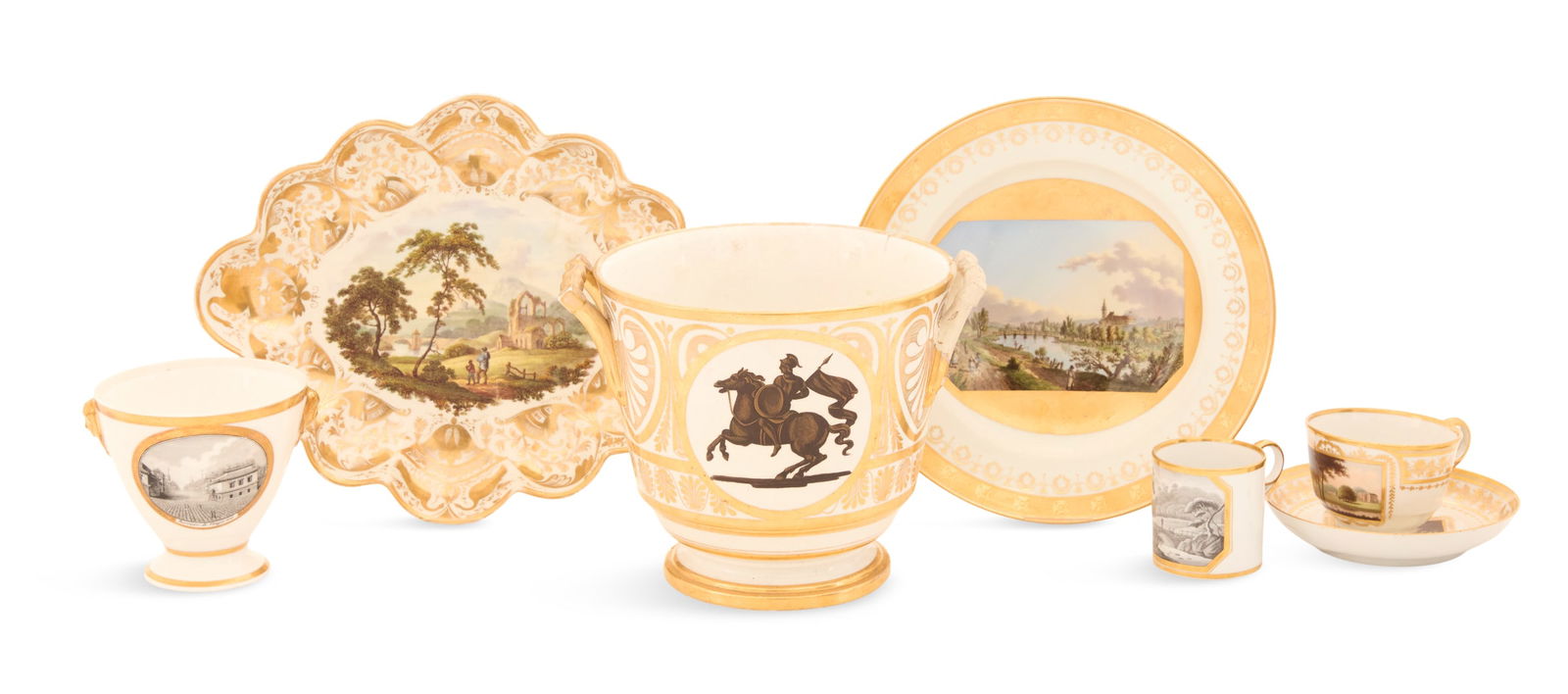 Seven Pieces of Neoclassical Porcelain: Seven Pieces of Neoclassical Porcelainearly 19th century, German, French and English, the collection including a Royal Berlin topographical plate, marked "Vue de St. Veit, pres de Schoenbrunn", dia. 9