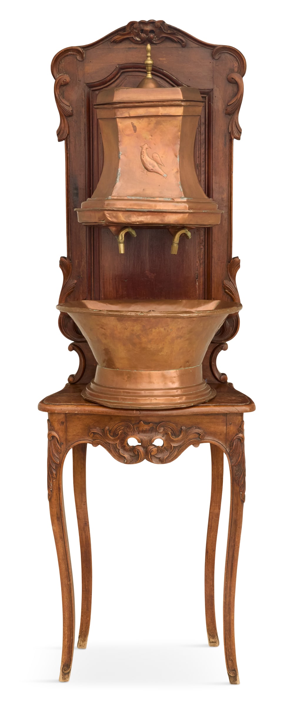 French Copper and Fruitwood Lavabo and Stand: French Copper and Fruitwood Lavabo and Standthird quarter 18th century, the fruitwood lavabo stand in the Louis XV provincial style with a raised panel back, the base on cabriole legs with rococo carv