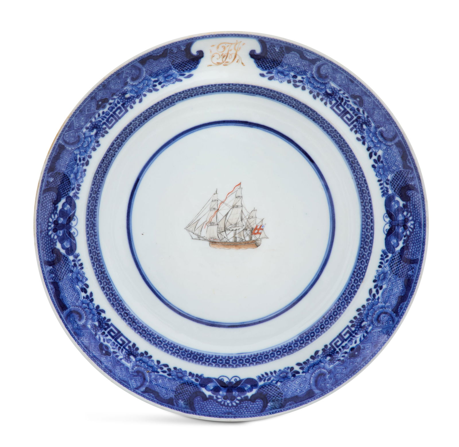 Chinese Export Porcelain Plate: Chinese Export Porcelain Plateca. 1800, decorated with a clipper ship flying one of the East India Company flags, monogrammed "T.J.", with a blue-and-white border.dia. 9-3/4"