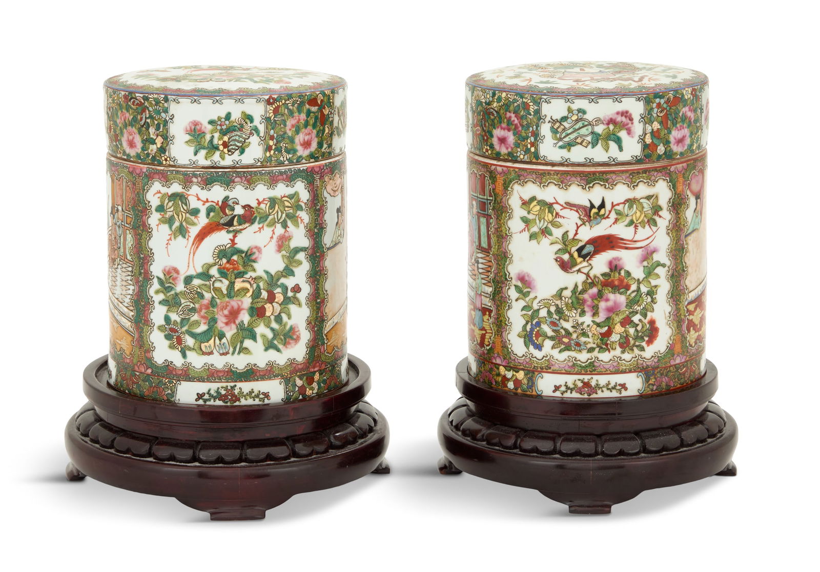 Pair of Chinese Export Rose Medallion Canisters: Pair of Chinese Export Rose Medallion Porcelain Canisters20th century, decorated with mandarin figures and panels of peonies and birds, with spurious seal marks on the bottoms, raised on wooden stands