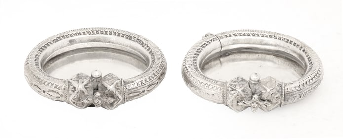 Near Pair of Bedouin Silver Bangle Trinkets Trays