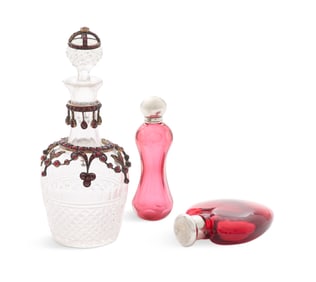 Three Ornamented Glass Scent Bottles
