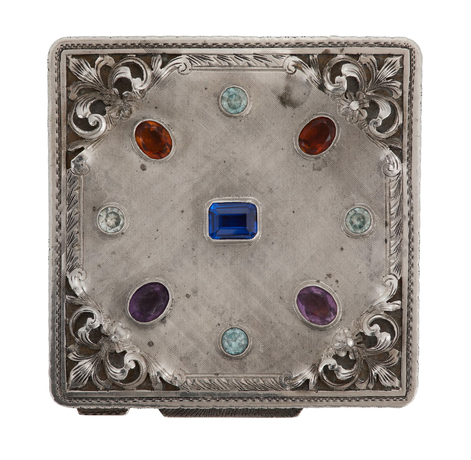 Italian Silver and Gemstone Compact: Italian Silver and Gemstone Compactmid-20th century, Florence, the mark rubbed but probably Renzo & Carlo Rocchi, .800 silver, square, the lid with brushed finish and applied openwork spandrels, with