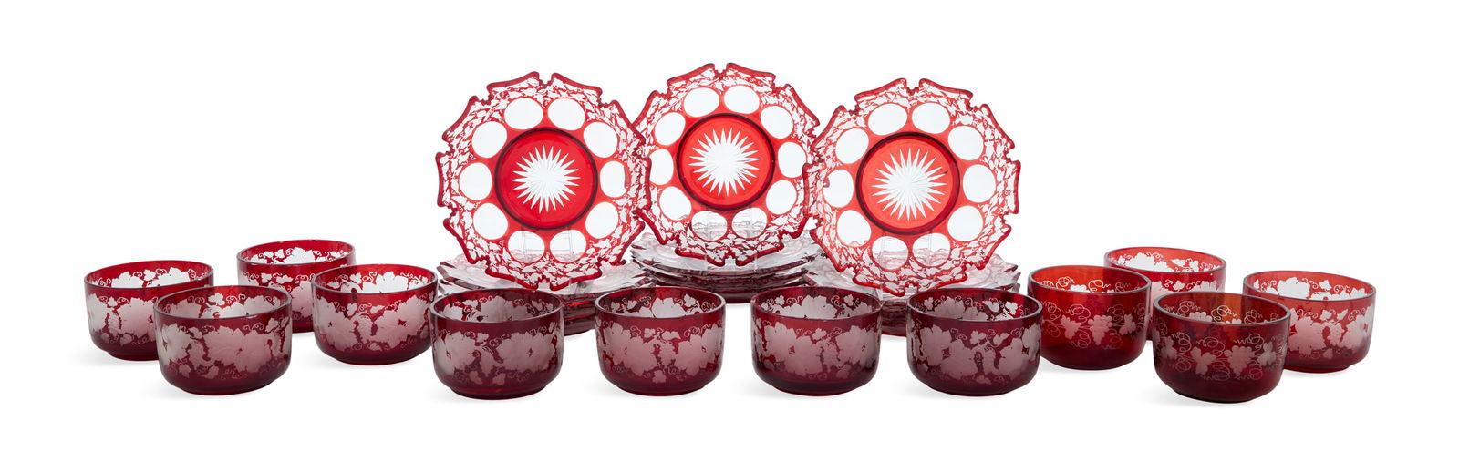 Twelve Bohemian Overlay Glass Finger Bowls: Twelve Bohemian Overlay Glass Finger Bowls and Standsca. 1860-1880, the ruby-cut-to-clear collection with bowls decorated with grapevines, the underplates with morning glories.h. 4-1/2", dia. 8-3/4" P