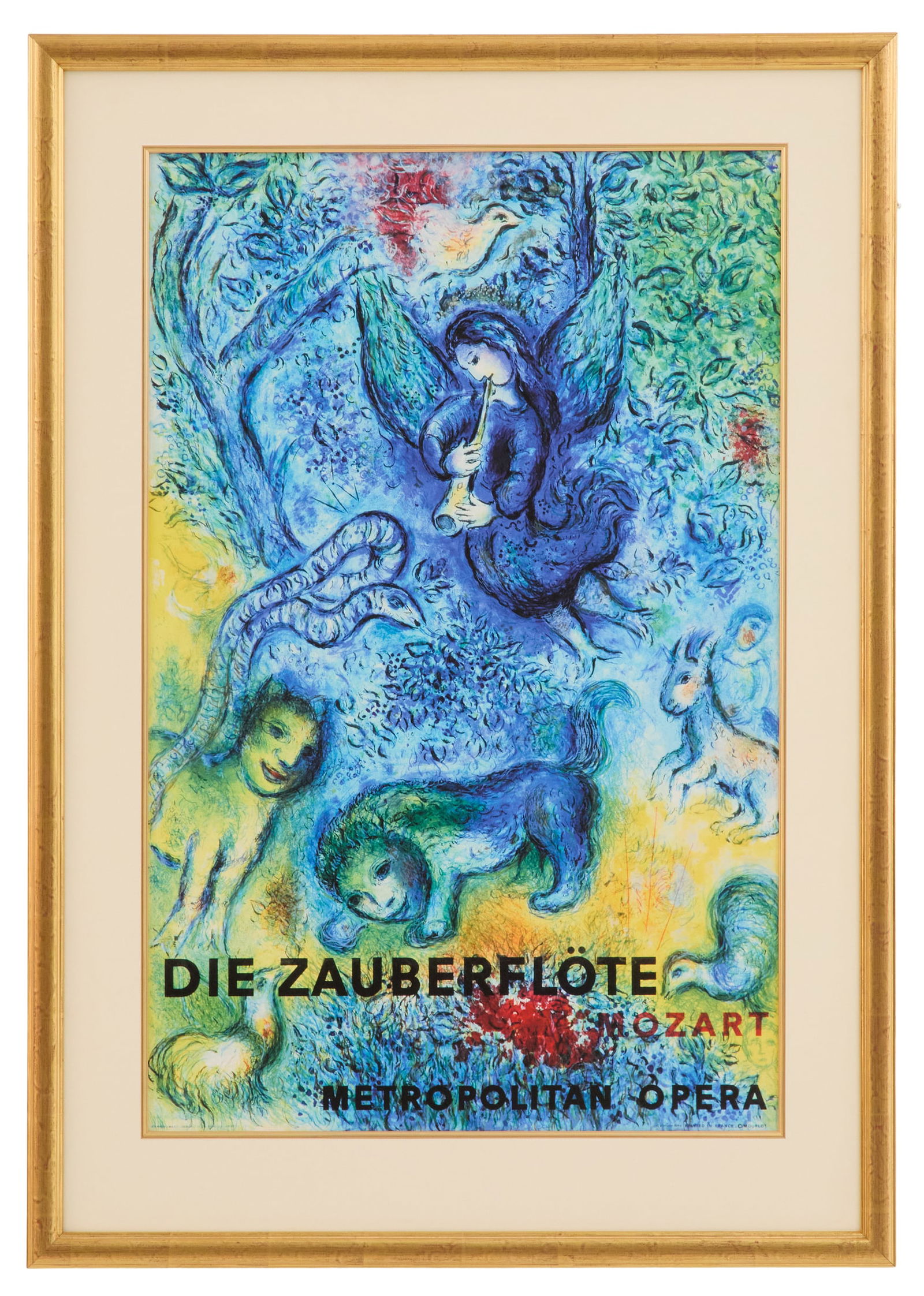 After Marc Chagall (Russian/French, 1887-1985): After Marc Chagall(Russian/French, 1887-1985)"Die Zauberflote"offset lithograph in colorsunsigned, poster for the Metropolitan Opera's production of The Magic Flute.Matted, glazed and framed.sight 30"