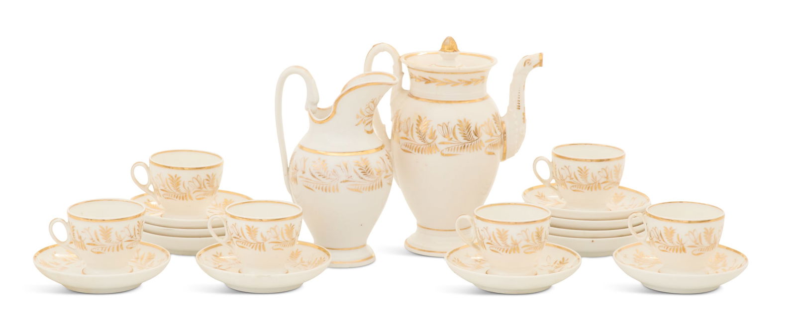Paris Porcelain Anneau d'Or Partial Tea Set: French Paris Porcelain Anneau d'Or Partial Tea Setca. 1830, decorated with gilt sprigging, the set including:one teapot with a molded eagle spout, h. 8-3/4";one cream jug, h. 7-1/4";six cups, h. 2-1/2