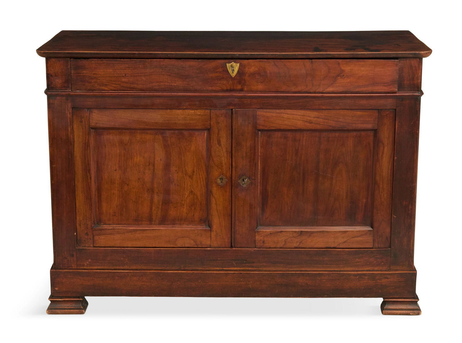 Louis Philippe Provincial Fruitwood Buffet: Louis Philippe Provincial Fruitwood Buffet ca. 1840, fitted with a single drawer over a pair of paneled cupboard doors, on molded feet. h. 36-1/2", w. 51-1/2", d. 22-1/4"