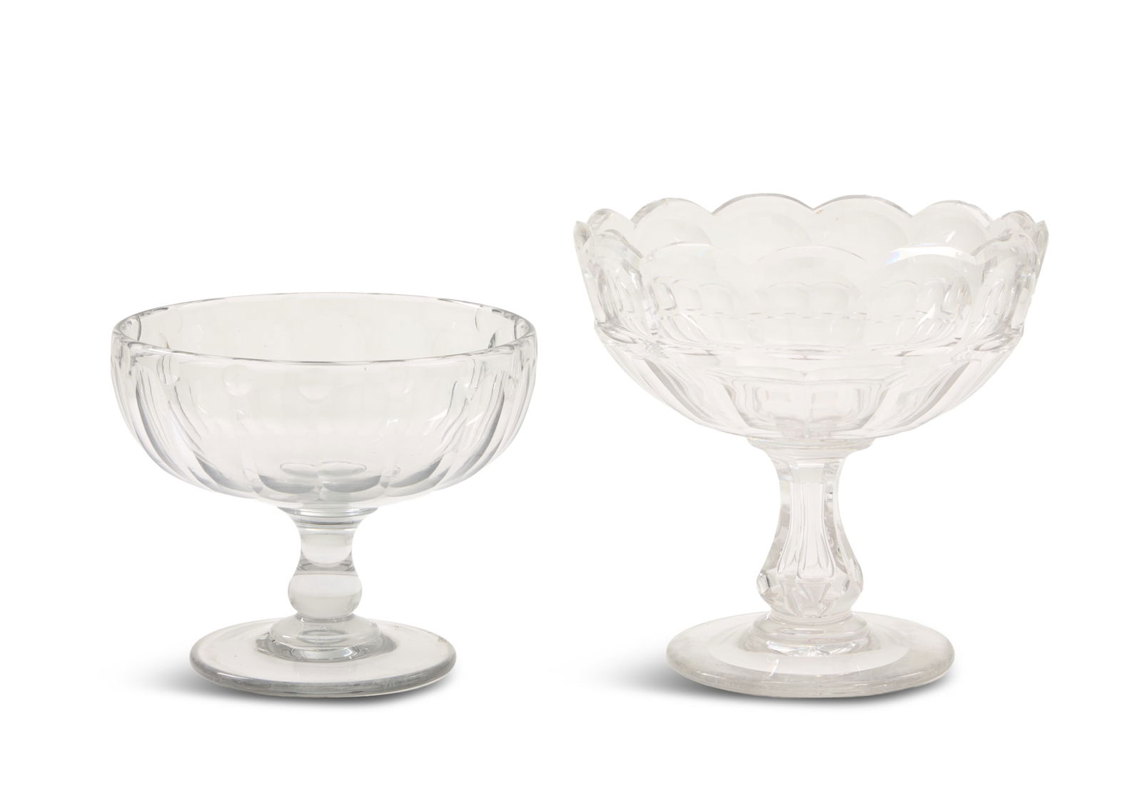Two American Cut-Glass Compotes: Two American Cut-Glass Compotes 19th century, the larger example with cut panels and the smaller panel-cut example with a balustre stem. h. 8-3/4" to 9-3/4", dia. 11" Provenance: The Estate of