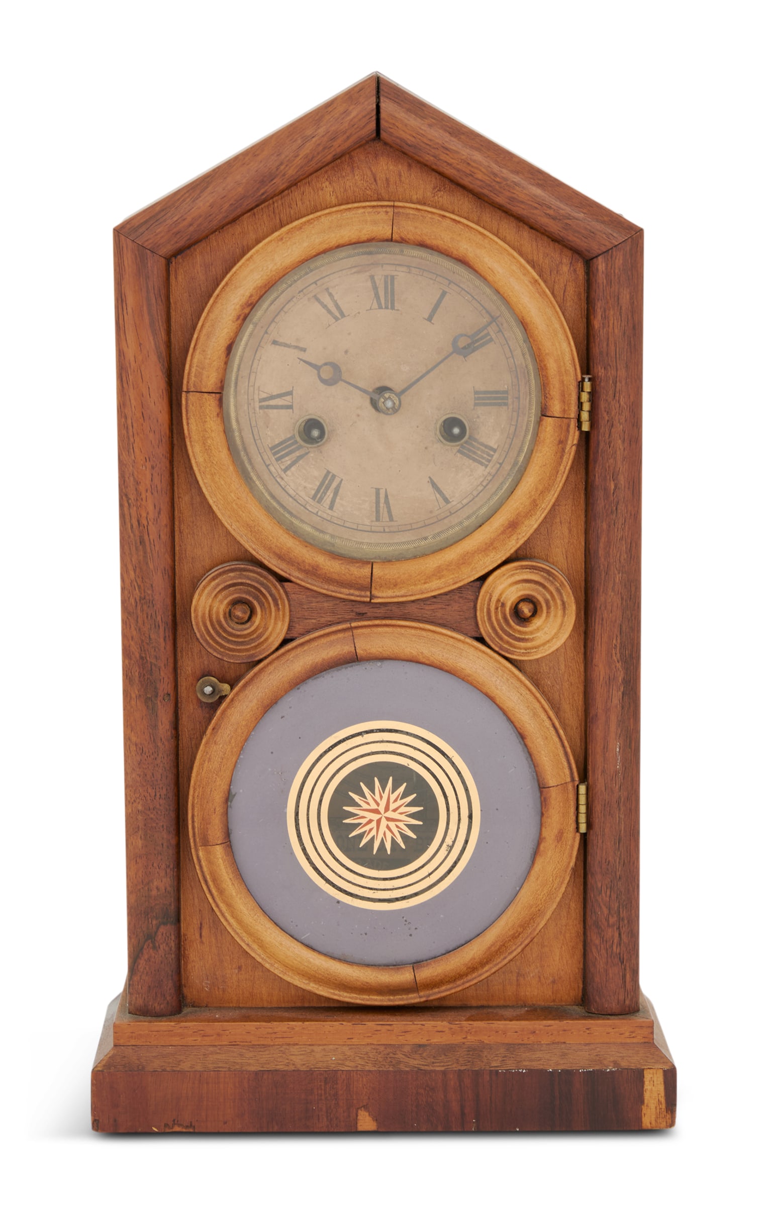 "Figure 8" Rosewood Shelf Clock: "Figure 8" Rosewood Shelf Clock late 19th century, Connecticut, the peaked roof over a circular dial and pendulum doors, the lower door with an original compass star eglomise decoration, labeled