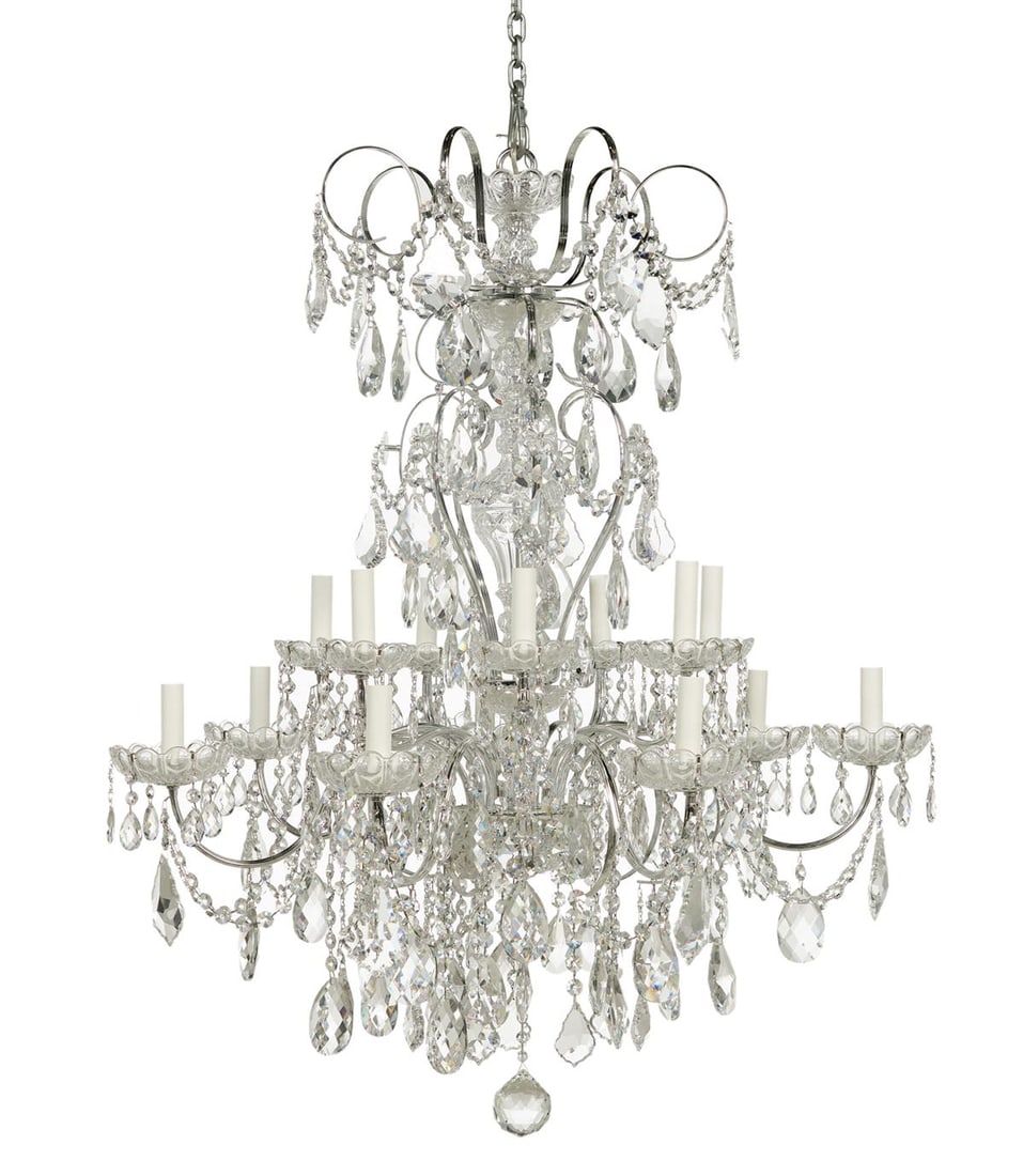 Schonbek and Swarovski "New Orleans" Chandelier: Schonbek and Swarovski "New Orleans" Fourteen-Light Chandelier 1970s, the polished silver frame and molded glass standard with Swarovski crystal drops, prisms and swags, set with two tiers of