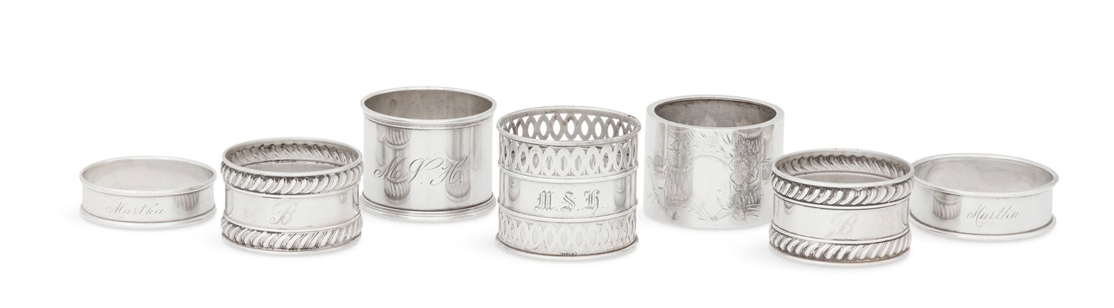 Seven American Sterling Silver Napkin Rings: Seven American Sterling Silver Napkin Ringsmid-20th century, including examples by Gorham, Watson and Towle, with two unmarked examples, variously monogrammed.dia. 1-3/4" to 2"; 4.3 total t. oz. Prove