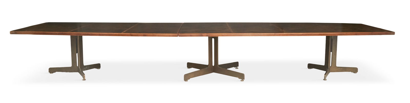 Monumental Mid-Century Modern Conference Table: Monumental Mid-Century Modern Mahogany Conference Tablethe shaped top with an inset brass writing surface, mounted to three shaped iron standards.h. 30", w. 59", l. 216"