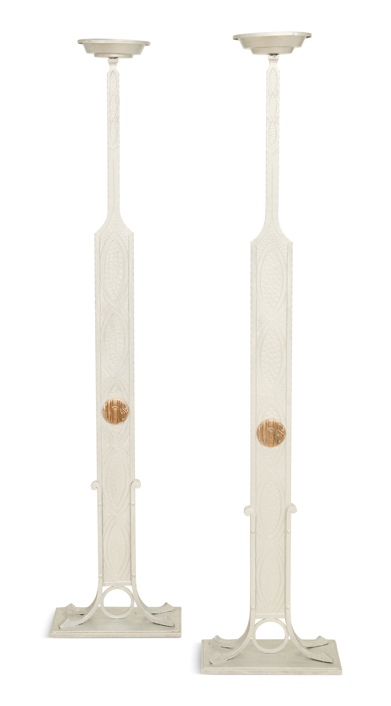 Pair of Art Deco Aluminum Altar Sticks: Pair of Art Deco Aluminum Altar Sticks second quarter 20th century, the ecclesiastical altar sticks with saucer-form candle holders, the "hammered" standards incised with Art Deco patterns, decorated