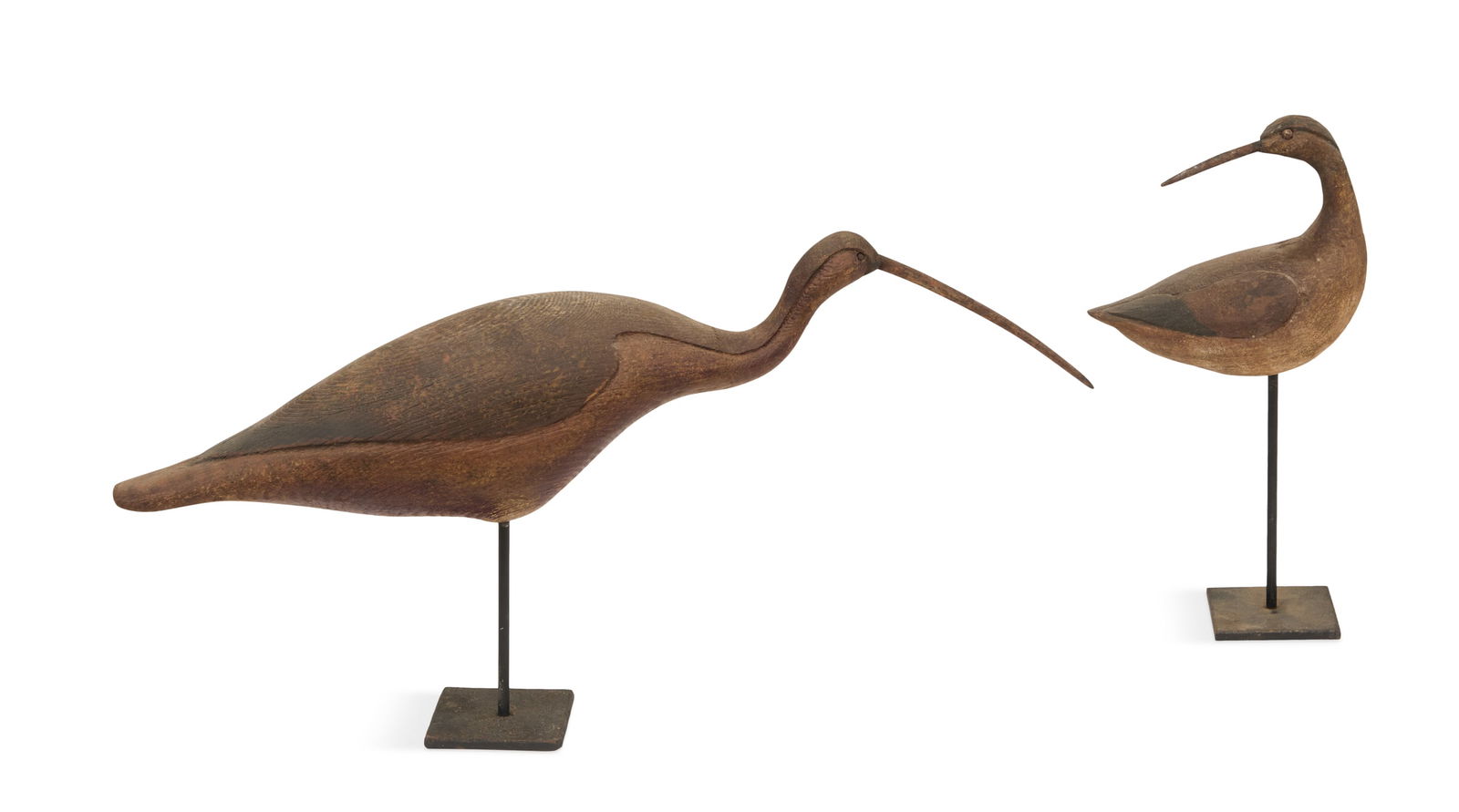 R.D. Wilson (USA/Texas, contemporary): R.D. Wilson(American/Texas, act. Late 20th/Early 21st Centuries)"Two Shore Bird Decoys"carved and painted wood on metal standseach with artist's monogram en verso.11" x 22" and 12" x 7" Provenance: Th