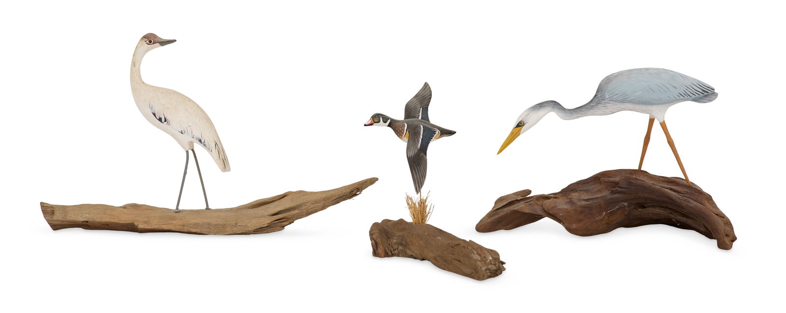 Chris Weaver (USA/Louisiana, contemporary): Chris Weaver(American/Louisiana, act. Late 20th Century)"Three Miniature Carvings of a Heron, Mallard Duck, and White Bird with Red Head"carved and painted wood with mixed media sculptures on salvaged