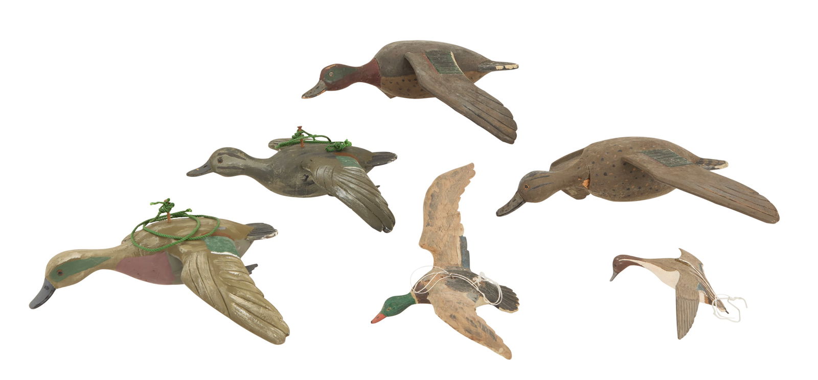 USA Folk Art School (Mid-20th Century): American Folk Art SchoolMid-20th Century"Six Duck Decoys in Flight"carved and painted woodunsigned.ranging from 2" x 8" to 4" x 7" Provenance: The Collection of Norbert Deshotels, Lafayette, Louisiana