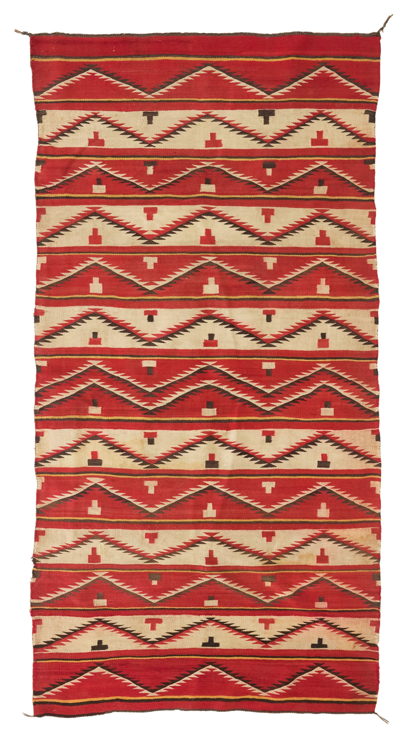 Navajo Transitional Period Blanket/Rug: Navajo Transitional Period Blanket/Rug20th century, the black, red and off-white weaving in an "eye dazzler" pattern, with sawtooth meanders and diamond motifs.w. 52-3/4", l. 100" Provenance: The Coll