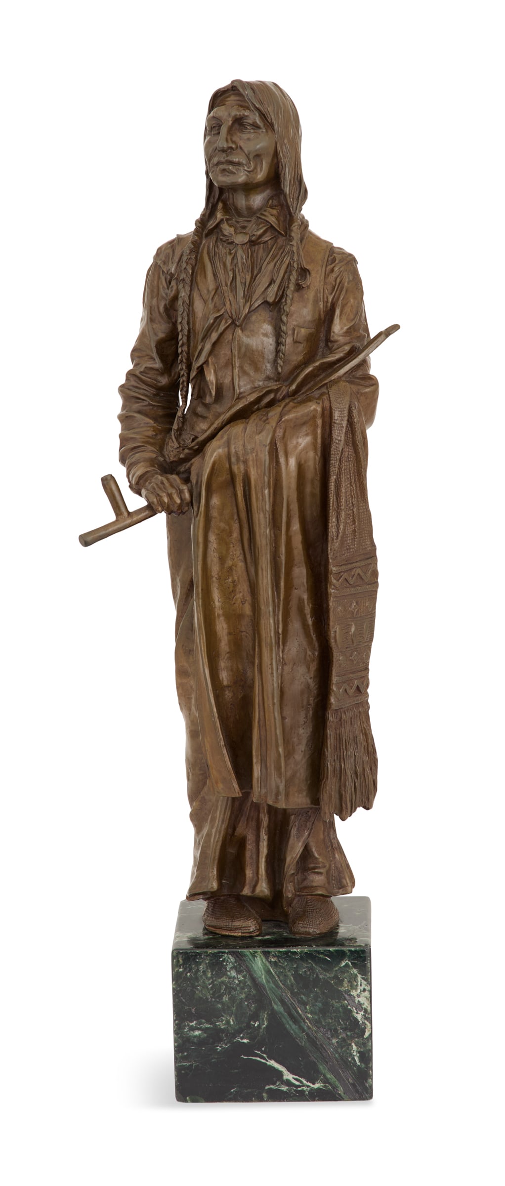 After Carl Kauba (Austrian/USA, 1865-1922): After Carl Kauba(Austrian/American, 1865-1922)"Chief Wolf Robe, Southern Cheyenne"patinated bronzecast signature along proper left side, after the 1898 photograph by Frank A. Rinehart (1868-1921), on