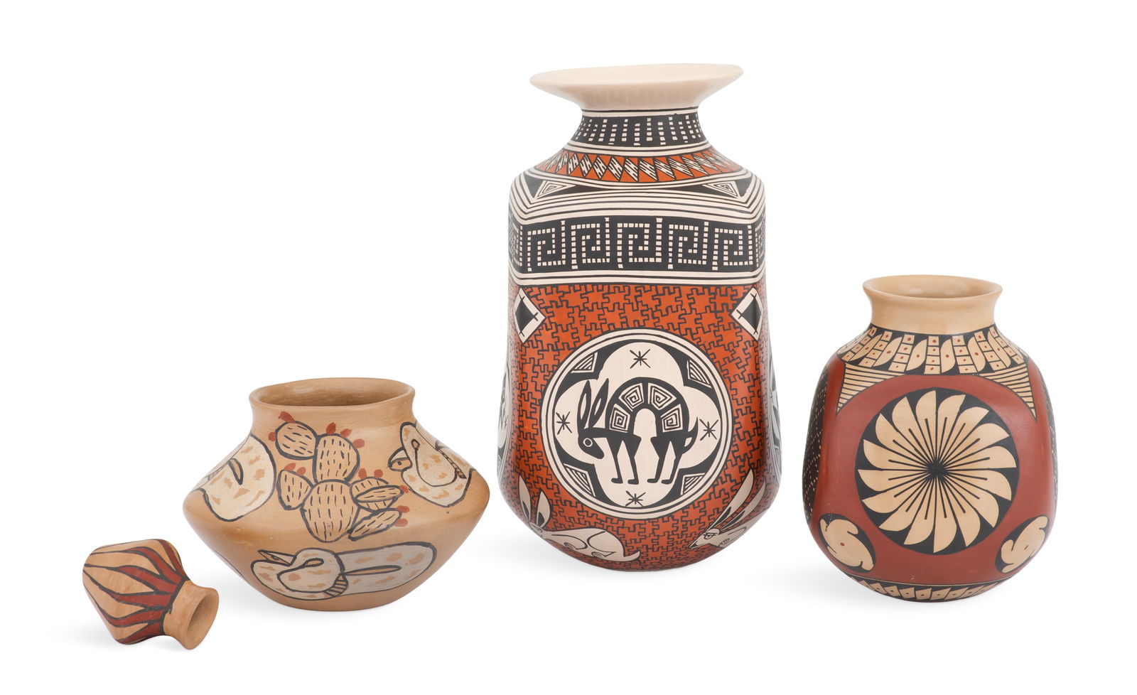 Four Pieces of Mata Ortiz Pottery: Four Pieces of Mata Ortiz Potteryincluding:a small olla, tan with red and black feather banding, h. 2-1/2", dia. 2";a Marta Gonzalez de Rodriguez round bottom olla, tan clay with painted white rattles