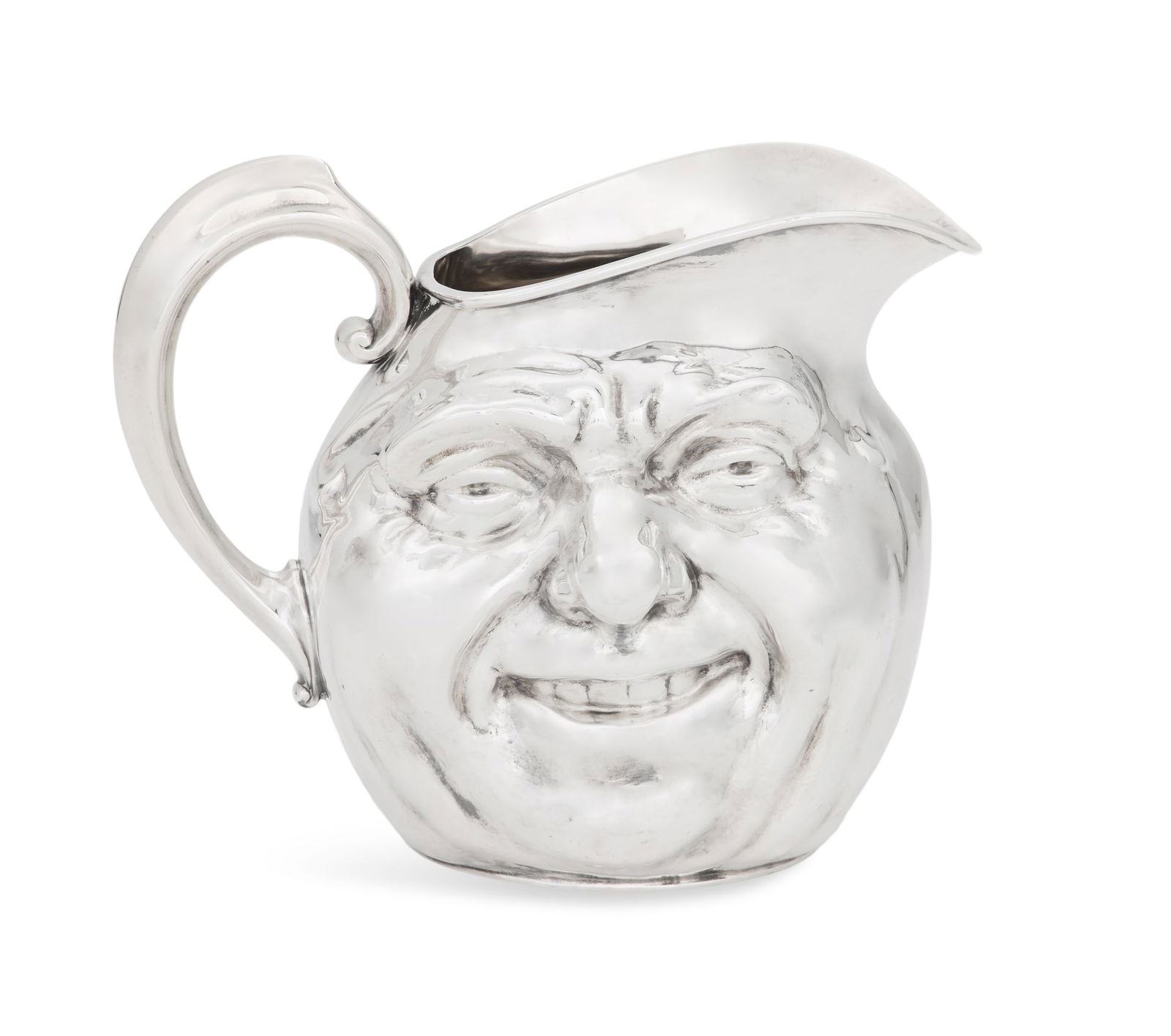 Reed & Barton Silverplate "Sunny Jim" Pitcher: Reed & Barton Silverplate "Sunny Jim" Pitchersecond quarter 20th century, Taunton, Massachusetts, of circular form and embossed on each side with a smiling face.h. 6-1/2", l. 8-1/2", w. 5-3/4" Note: T