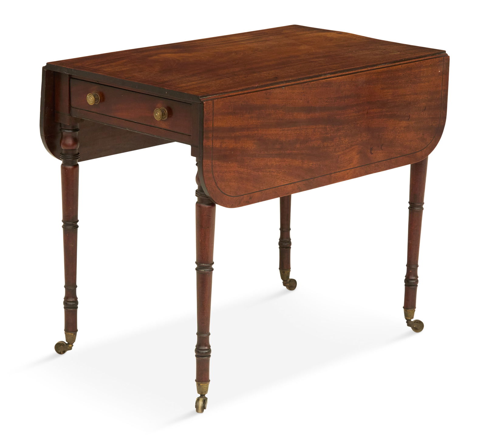 English Mahogany Pembroke Table: English Mahogany Pembroke Table19th century, the top and leaves with an ebony string-inlaid border, one end fitted with a drawer, raised on turned circular legs ending in brass cup casters.h. 28-1/2",