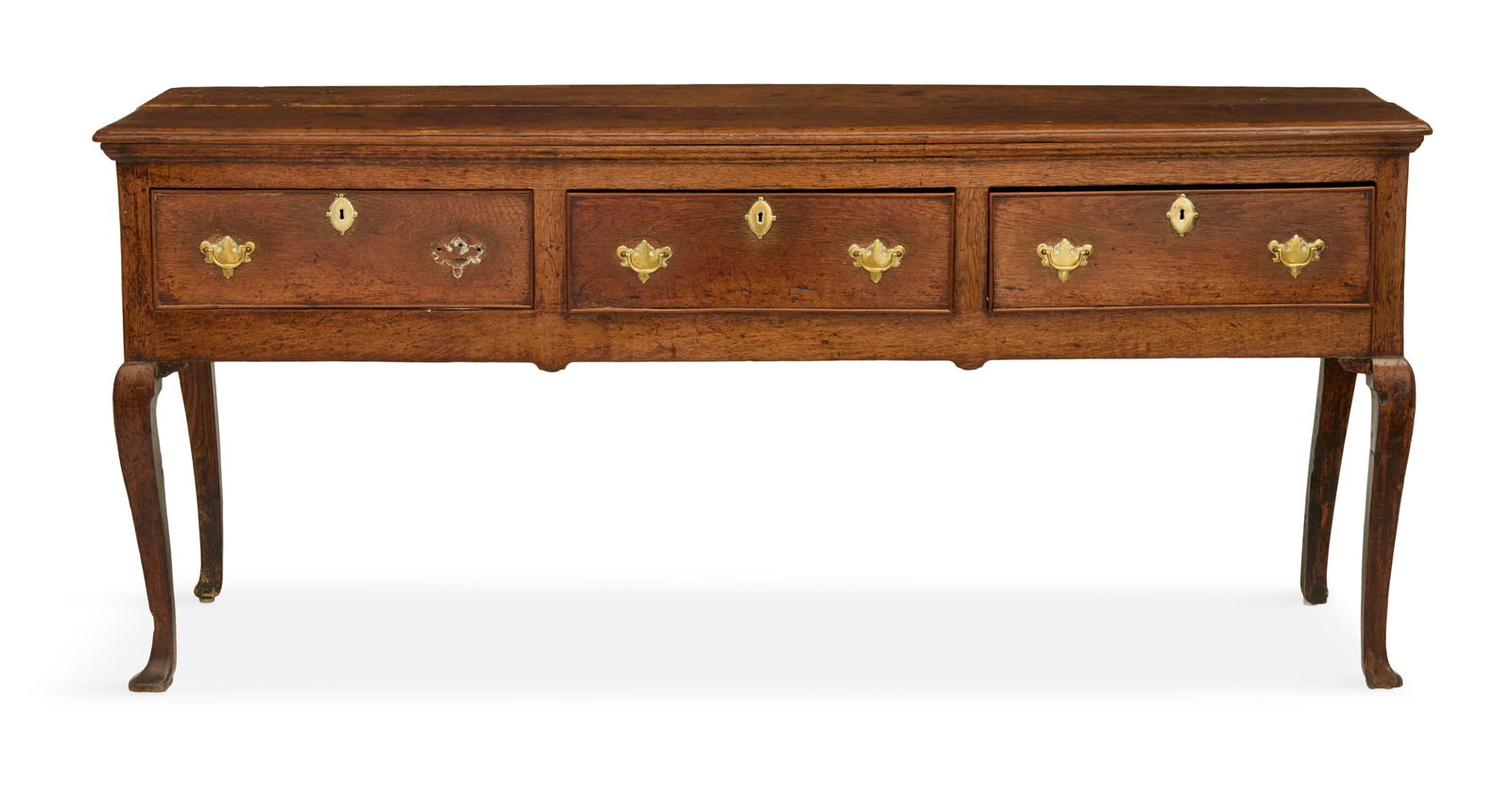 Queen Anne Welsh Oak Server: Queen Anne Welsh Oak Server18th century, the top with a molded edge and under molding, over a row of three drawers, raised on cabriole legs.h. 31-1/2", w. 73", d. 20" Provenance: The Collection of Deb