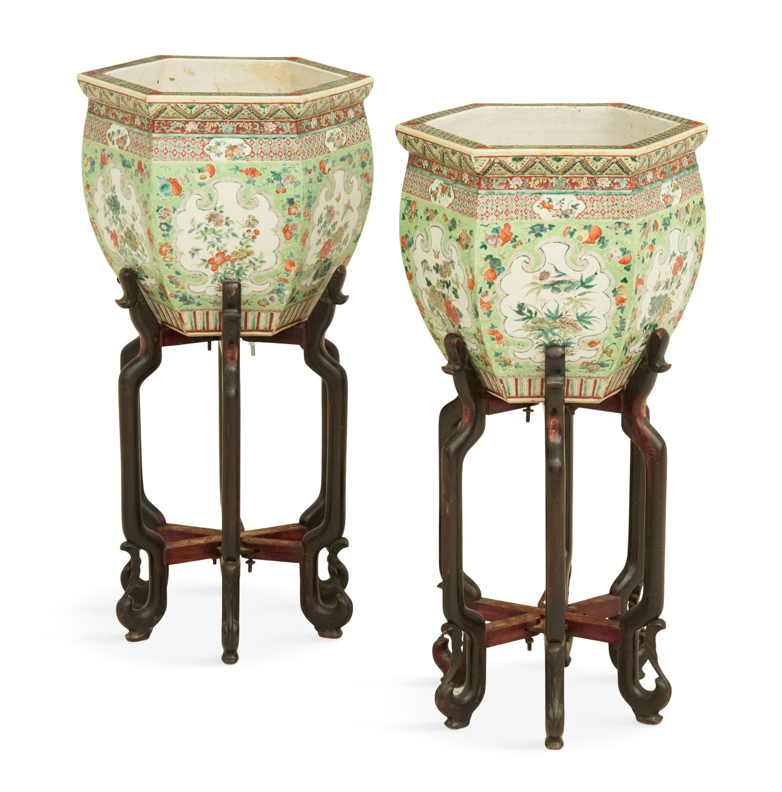 Pair of Famille Verte Cache Fish Bowls on Stands: Pair of Famille Verte Cache Fish Bowls on Stands 19th century, the hexagonal tapered and faceted bowls decorated with scroll-bordered panels of flowers and insects on a pale green ground scattered