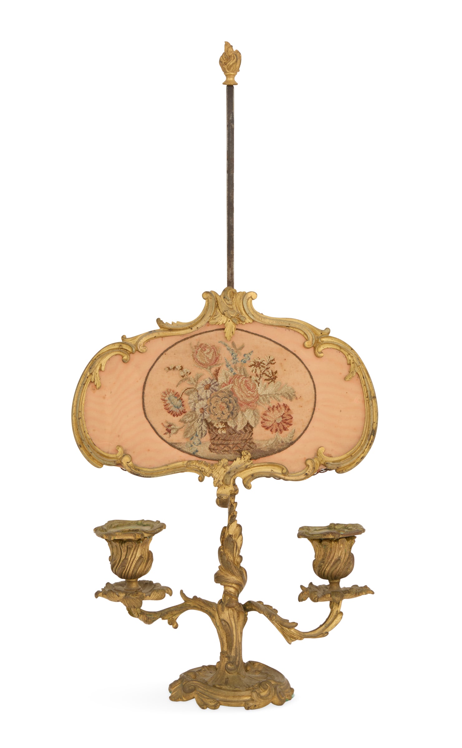 French Belle Epoque Bouillotte Lamp: French Belle Epoque Bouillotte Lamplate 19th century, in the Louis XV taste, set with an adjustable shade composed of a bronze frame set with a needlepoint panel of a basket of flowers rendered un pet