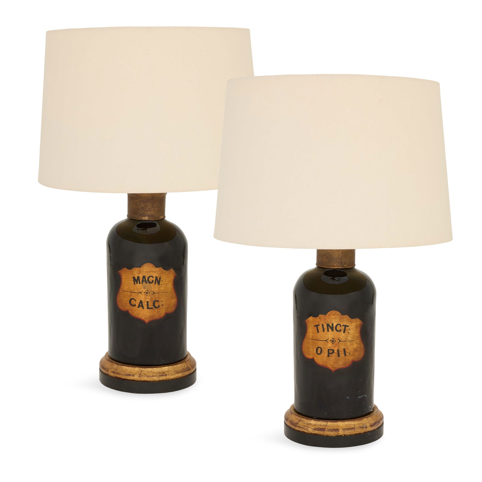 Pair of Tole Apothecary Jar Lamps: Pair of Tole Apothecary Jar Lamps 19th century and later, fitted with tole covers, the black glass apothecary jars now mounted as lamps, with 19th-century paper labels describing the contents, on