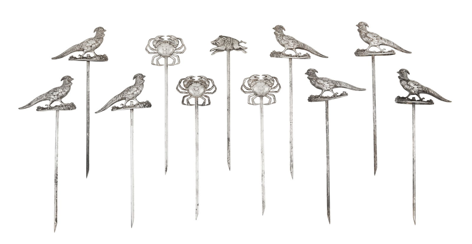 Eleven French Silverplate Game Skewers: Eleven French Silverplate Game Skewers first quarter 20th century, each with a detailed figural animal finial: seven golden pheasants, three crabs, and a boar. l. 8-1/2" to 9-1/2" Provenance: The