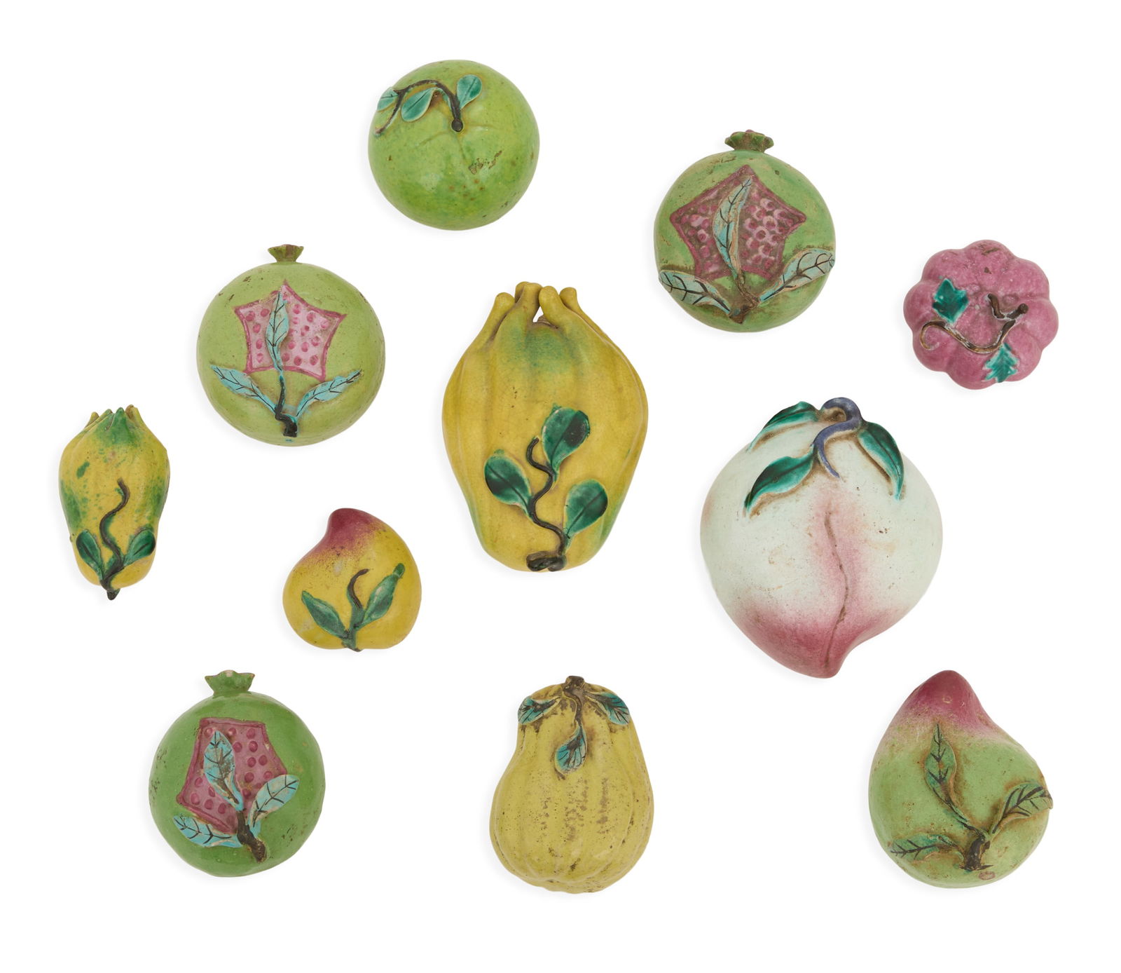 Eleven Pieces of Chinese Porcelain Altar Fruit: Eleven Pieces of Chinese Porcelain Altar Fruit Qing Dynasty (1644-1912), the polychrome-painted collection including peaches, pomegranates and squash. h. 1-3/4" to 3-3/4", l. 2-1/2" to 5" 