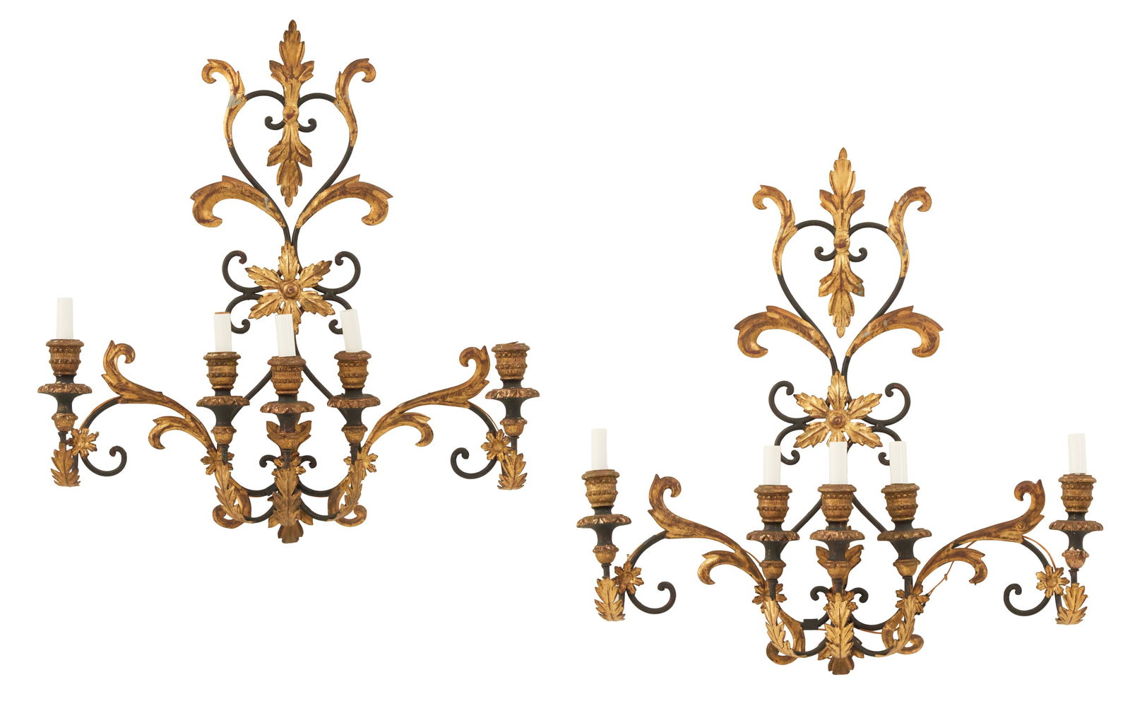 Pair of Italian Parcel-Giltwood and Metal Sconces: Pair of Italian Parcel-Giltwood and Metal Sconcesmid-20th century, the scrolled and pierced black metal backplates decorated with gilt-metal leaves, scrollwork and flower heads, set with parcel-giltwo