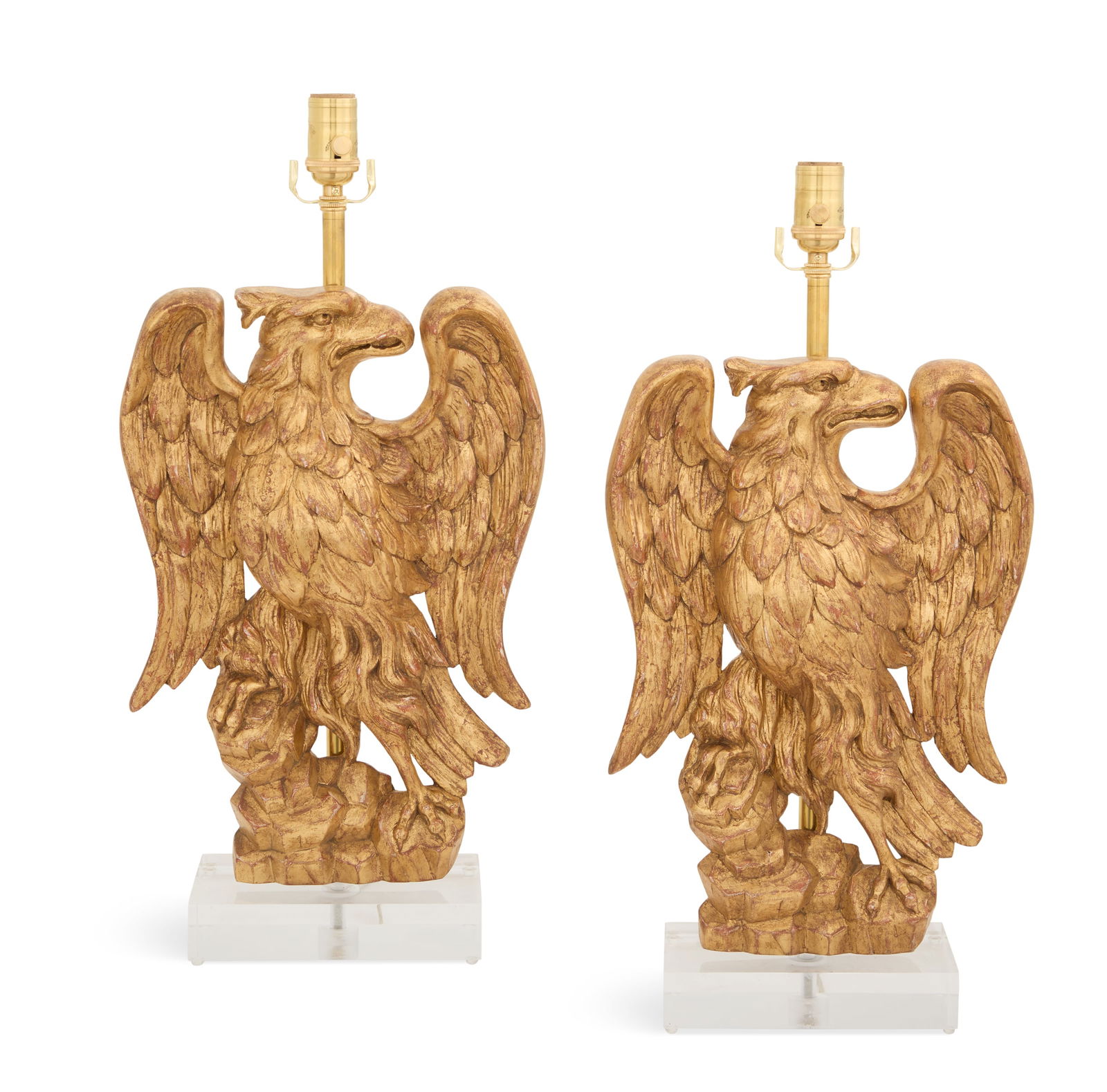 Pair of Giltwood Eagle Table Lamps: Pair of Giltwood Eagle Table Lampsmid-20th century and later, the eagles poised on rocky outcroppings, on acrylic bases.h. 24", w. 11-1/4", d. 5"