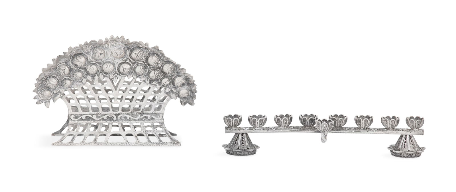 Two Pieces of Small Silver Judaica: Two Pieces of Small Silver Judaica contemporary, including: a small sterling silver menorah, Jerusalem, with filigree sockets and feet, l. 5-1/4"; and an .800 silver matzoh holder, Hazorfim, in the