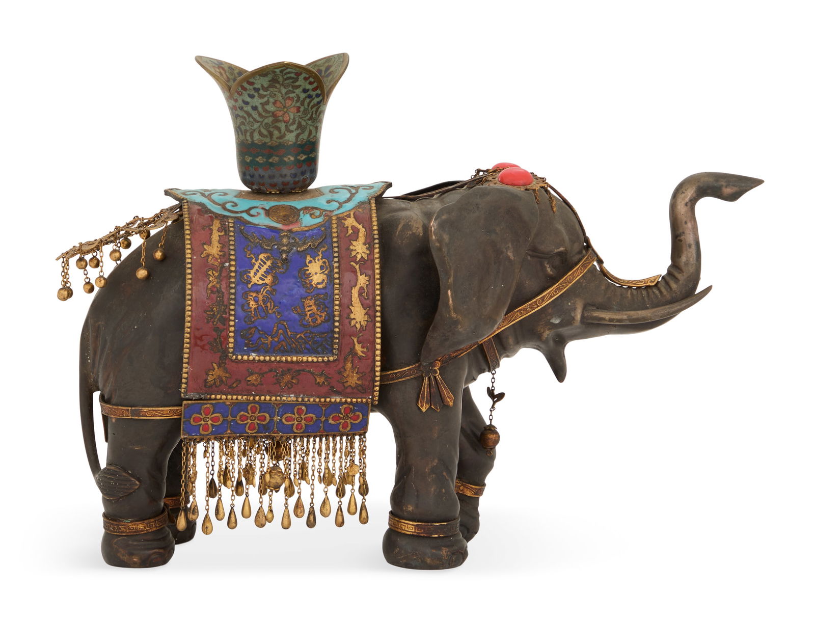 Chinese Cloisonne Elephant-Form Candlestick: Chinese Cloisonne Elephant-Form Candlestick 19th century, the metal elephant set with a cloisonné tripartite candle socket atop the enamel-decorated ceremonial saddle, hung with brass fringe and