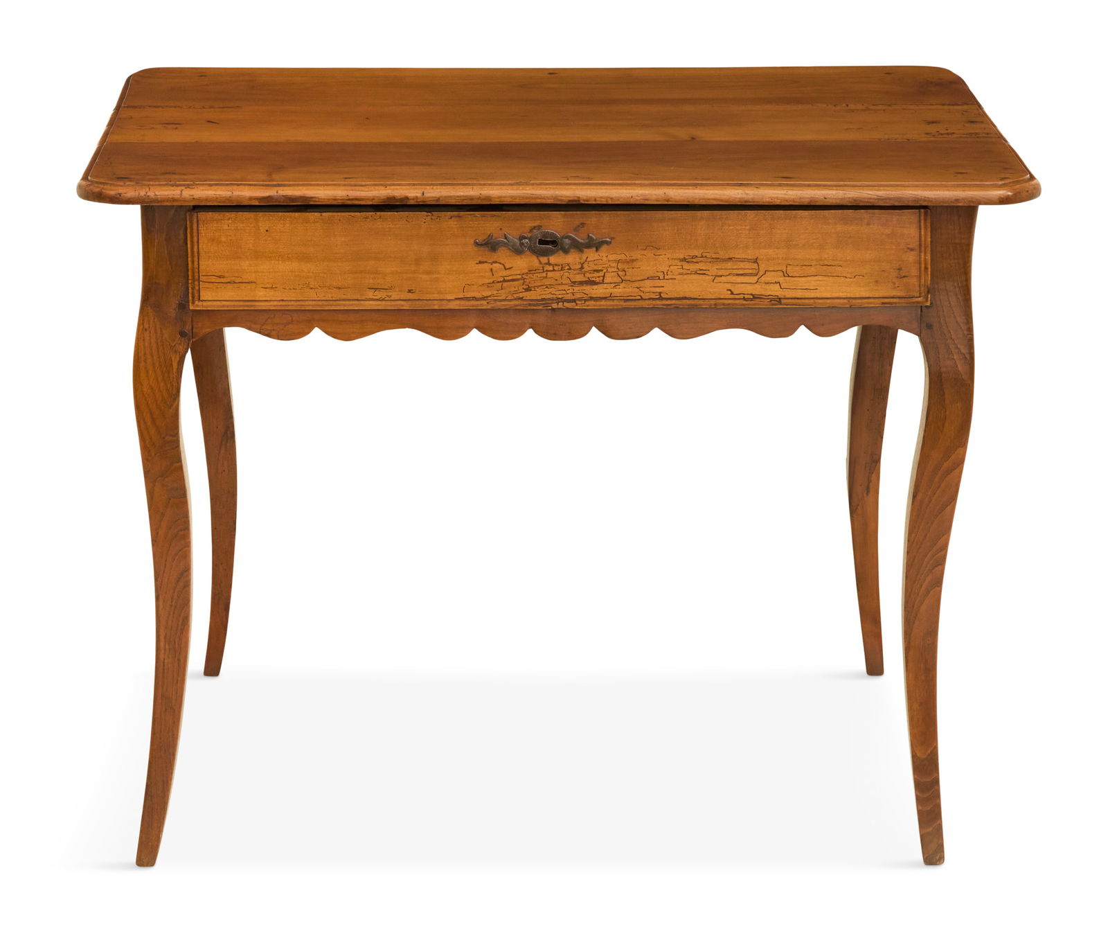 Provincial Louis XV Mixed-Wood Side Table: Provincial Louis XV Walnut and Fruitwood Side Table18th century, the top with a simple molded edge and rounded corners, over a single drawer, with scalloped aprons and raised on slender square and tap